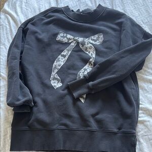Aerie Black Crew Neck Sweater with Floral Bow fits like a M/L